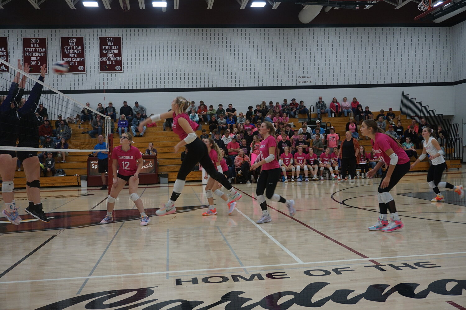 Outside hitter Ella Stangl goes up to make the play in Spring Valley Thursday night.