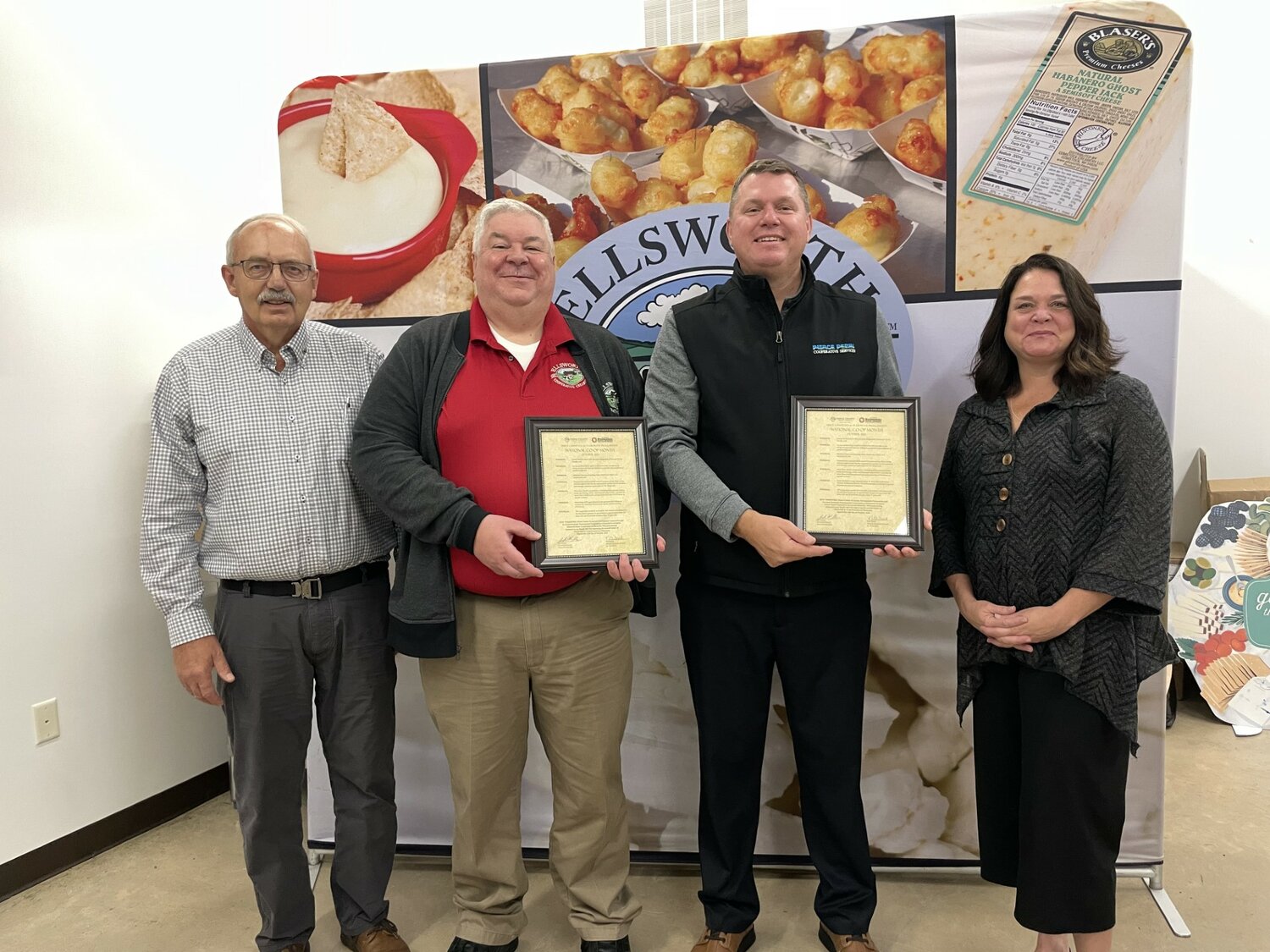 On Oct. 24, Pierce County Executive Director Joe Folsom (left) and St. Croix EDC President Krista Paulus (right) presented proclamations to Ellsworth Cooperative Creamery CEO Paul Bauer (second from left) and Nate Boettcher of Pierce Pepin Cooperative Service (third from left) for National Cooperative Month.