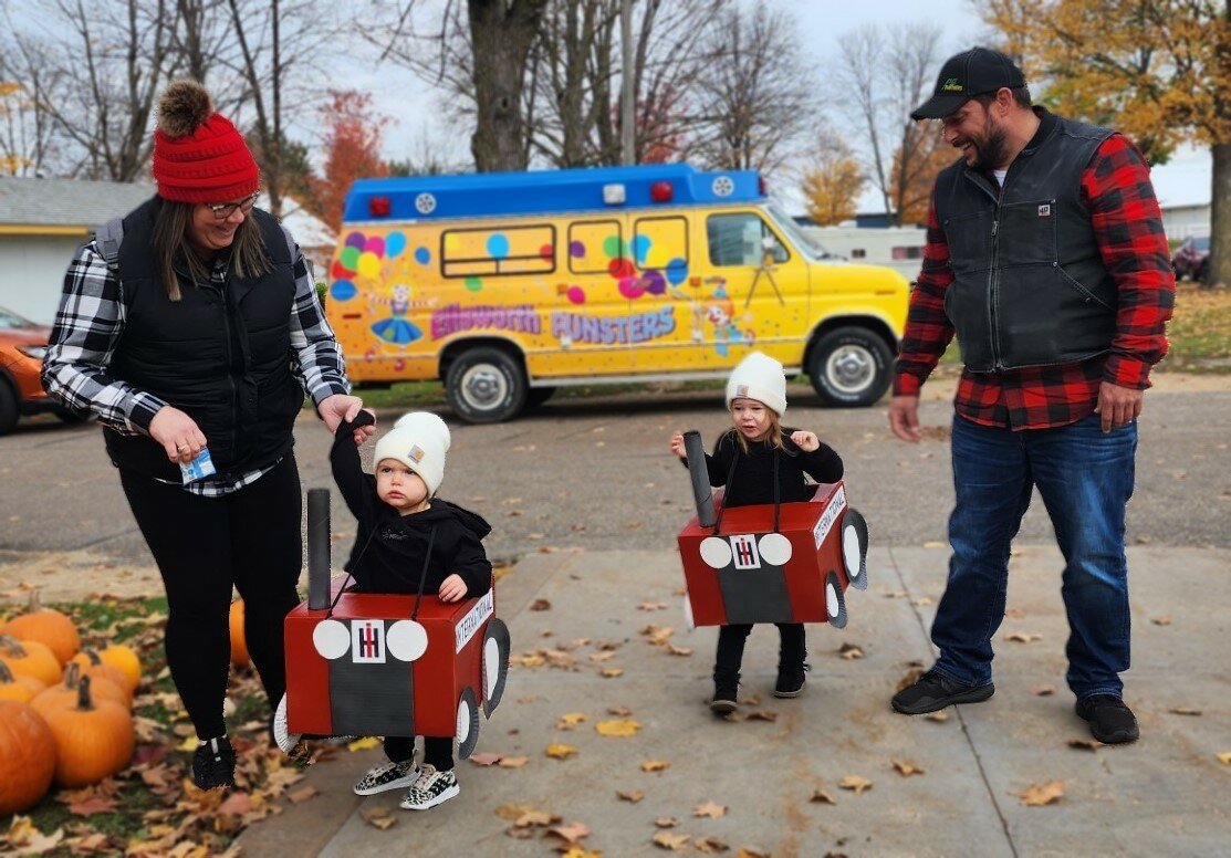 Brynlee and Blair Hoikka made a cute pair of International tractors at Saturday’s Ellsworth Funsters Pumpkin in the Park event. Their parents John and Bailee Hoikka of Ellsworth led them along.