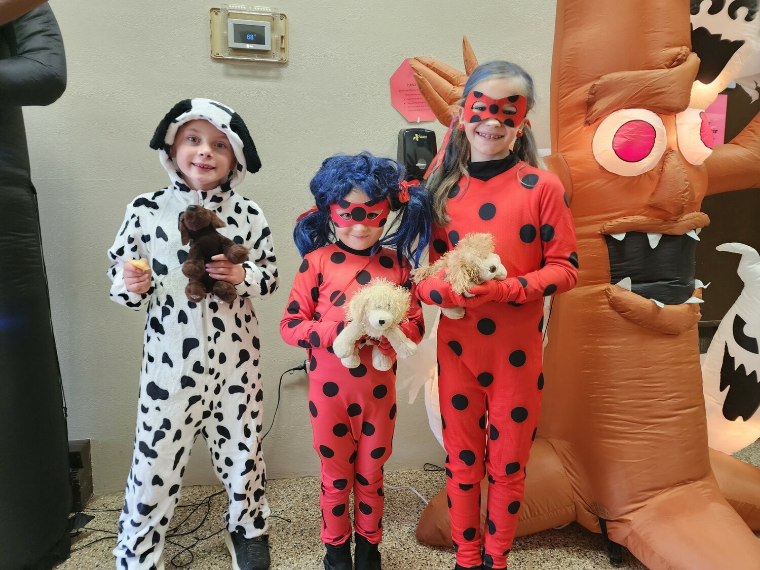 Clint Thom made an excellent dog, while Clare Thom and Ashlyn Kaltenbrun channeled the Miraculous Ladybug at Ellsworth’s Pumpkin in the Park Saturday, Oct. 28.