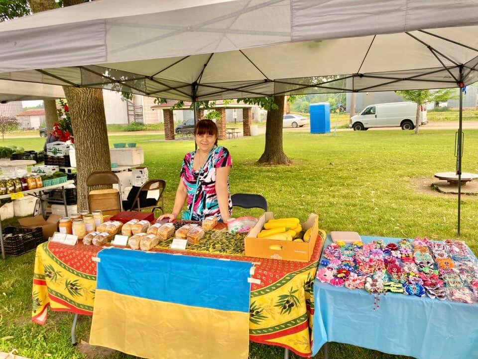 Valentyna Benson sells homemade bread, salsa, sauerkraut and more at her farmstand near Roberts and at the Baldwin Farmers Market, raising money to send to her children in Ukraine.