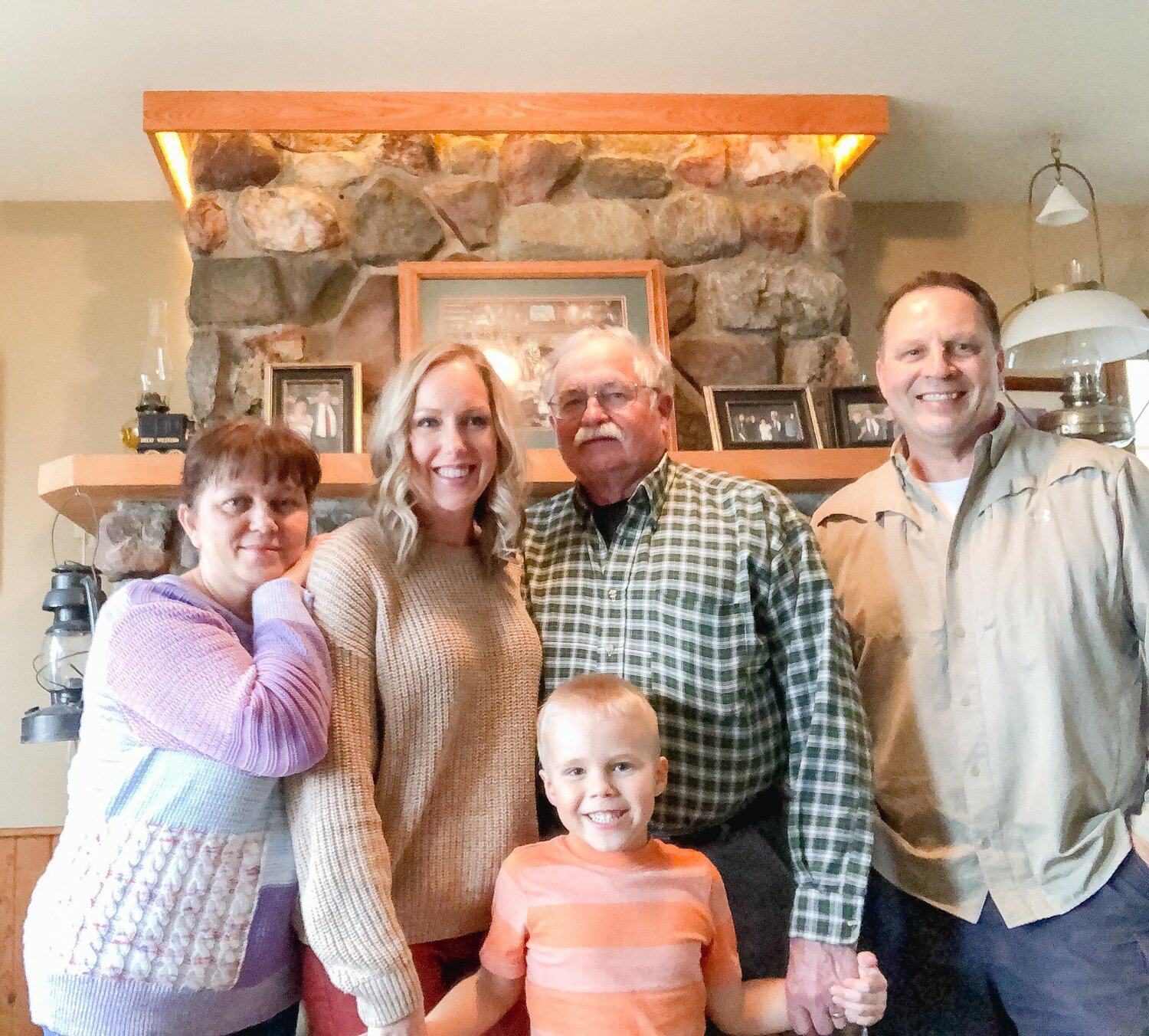 Valentyna Benson (far left) with her stepdaughter Melinda Casper, grandson Raleigh Casper, husband Tom Benson and son-in-law Ryan Casper.