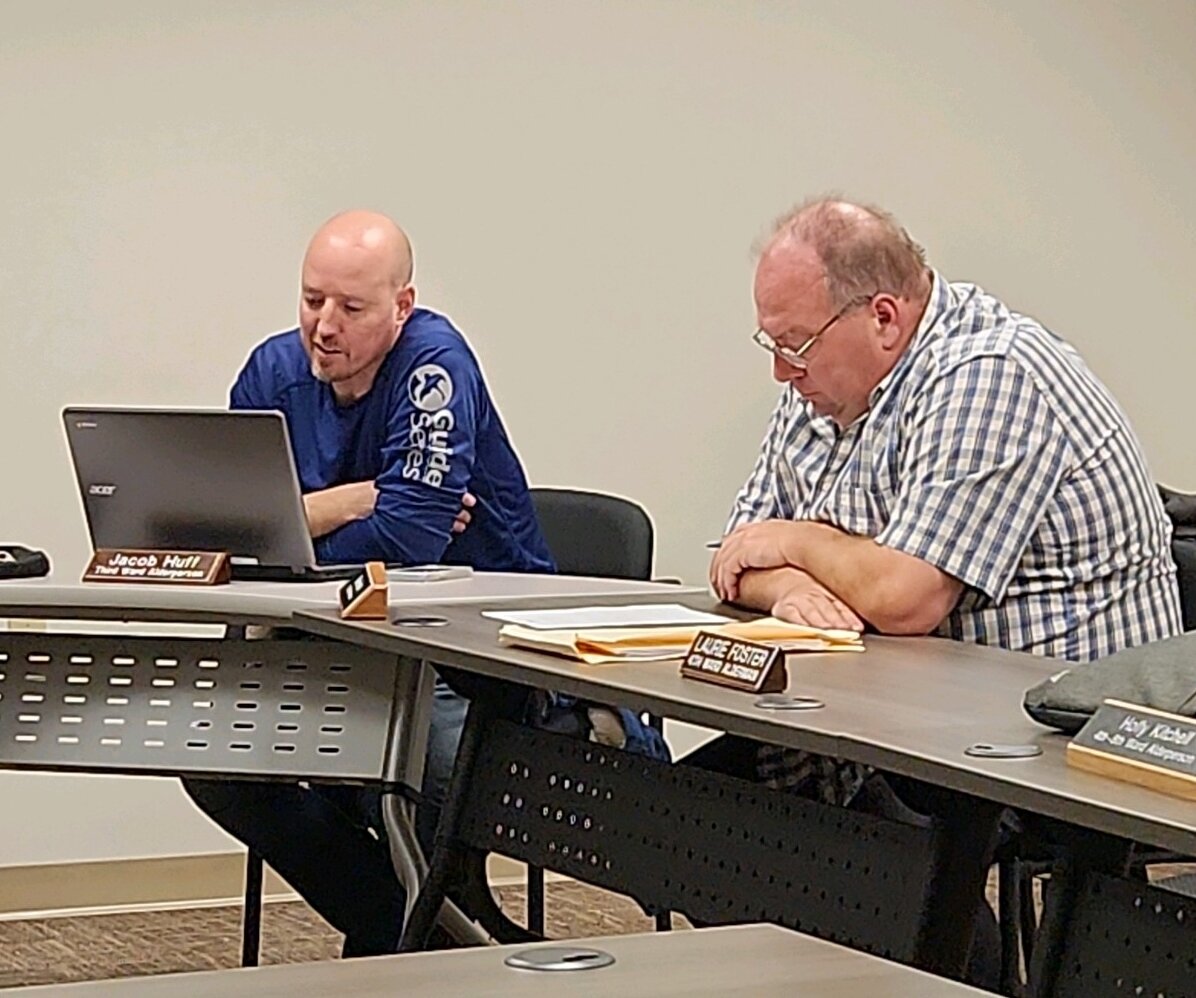Ward 3 Alderperson Jacob Huff (left) and Ward 3 Alderperson Mike Henke consider the ramifications of an alternative work schedule for City of Stanley employees at the Monday evening Council meeting held at City Hall.
