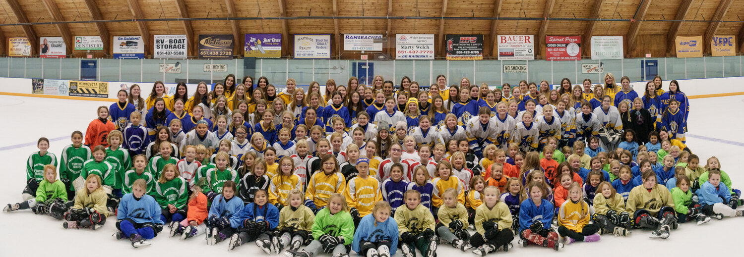 Girls from every age group gathered on center ice for the annual all girls hockey photo. The photo contains kids from the U6 Learn to Skate program up to the varsity level.