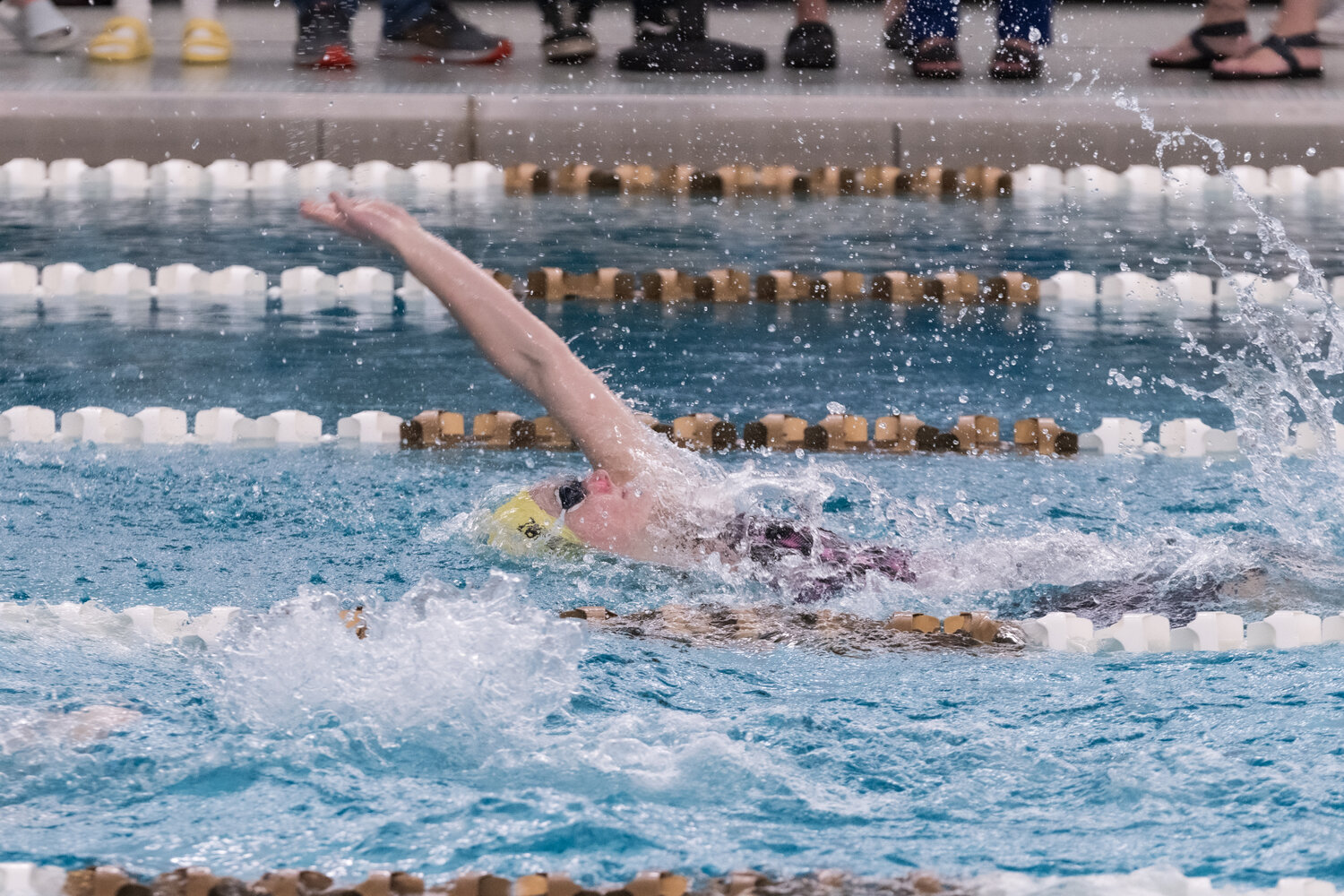 Senior Ashtyn Stewart swims an emotional last 100-backstroke. Stewart placed third overall in the section, missing a second-place finish and trip to state by 1.62 seconds. Stewart is also an excellent diver finishing eighth overall with a score of 313.20.