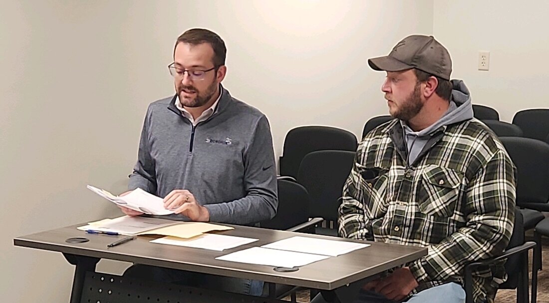 Eric Linney (left) with City of Stanley Wastewater Operator Nick Martin (right) addresses the Stanley City Council at the Nov. 20 regular bimonthly meeting to explain his findings on the recent wastewater plant study
