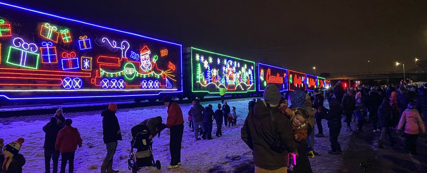 Canadian-Pacific Holiday Train shopping in Cottage Grove, December 2022.
