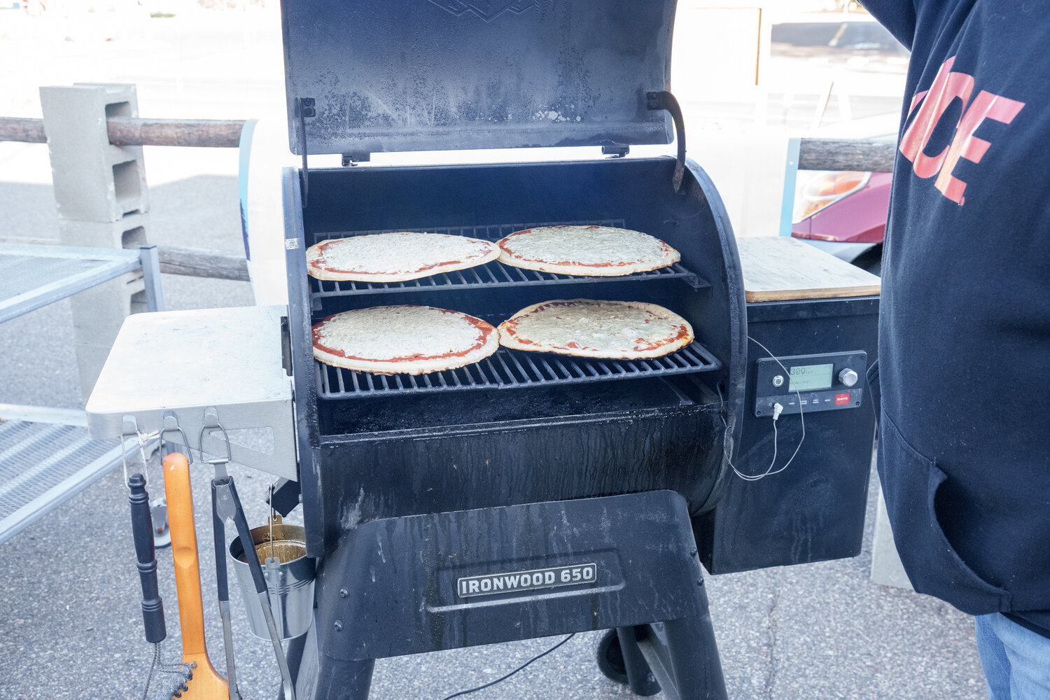The team at Hometown Ace Hardware had some fun with their pizza giveaway event on Thanksgiving morning by cooking pizzas on their Traeger grill. The smell of the pizzas cooking was awesome. Hopefully, the taste was even better for the lucky folks that received one of the grilled pizzas.