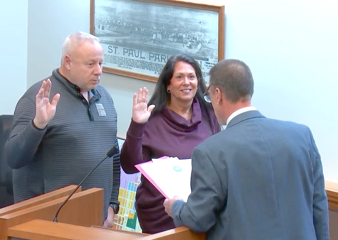 Following his swearing in by council member Jeff Swenson, Mayor Keith Franke (right) then swore in council members Tim Conrad and Charlene Whitbred-Hemmingson at the Jan. 2, 2024 regular council meeting.
