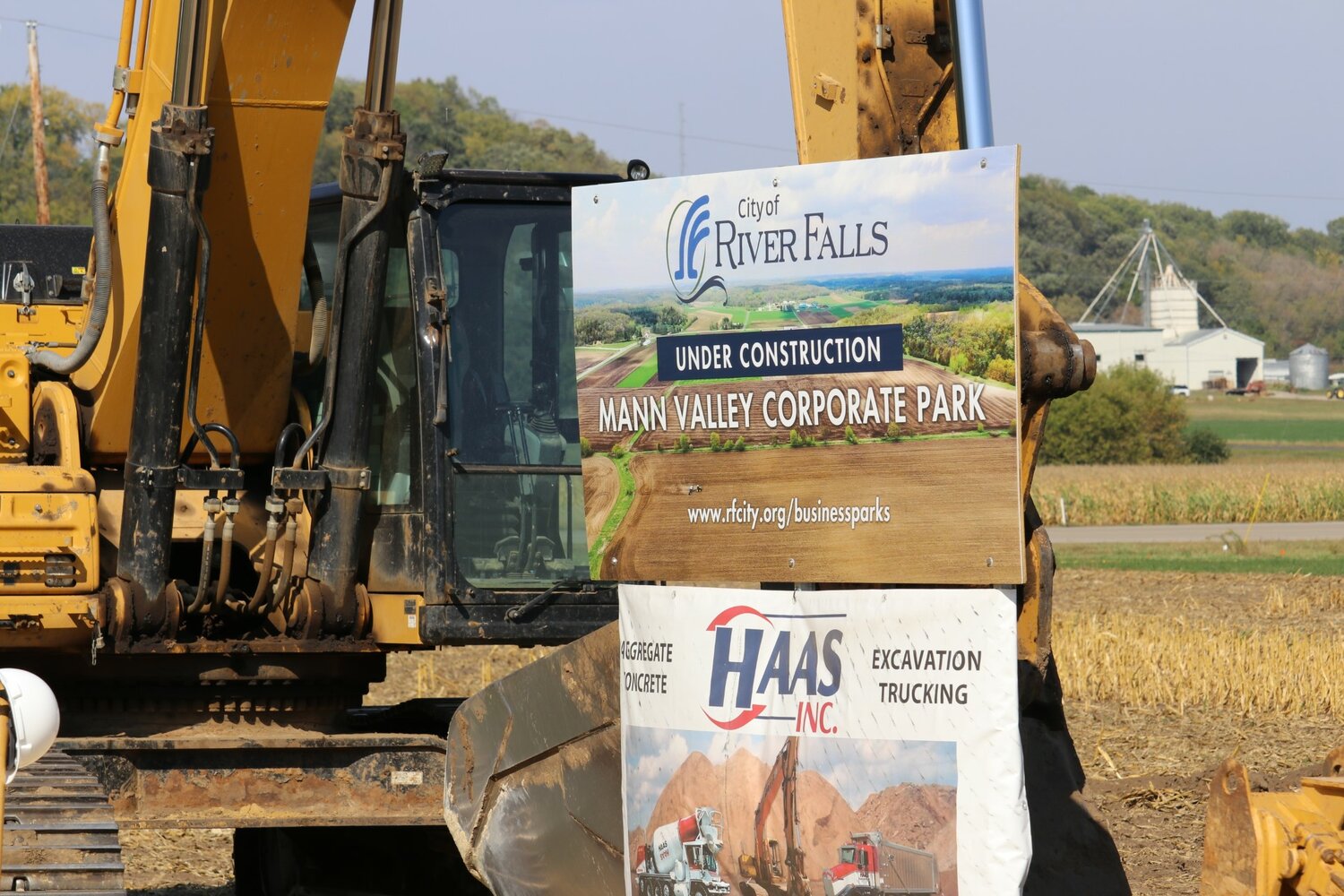 Signage advertises the upcoming Mann Valley Corporate Park at the project’s groundbreaking ceremony in September 2023.