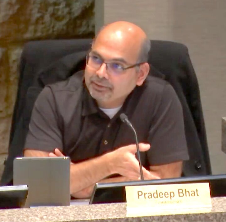 Plan Commissioner Pradeep Bhat asks a question of Melissa Barrett from Kjolhaug Environmental at the Jan. 22 Cottage Grove Plan Commission meeting