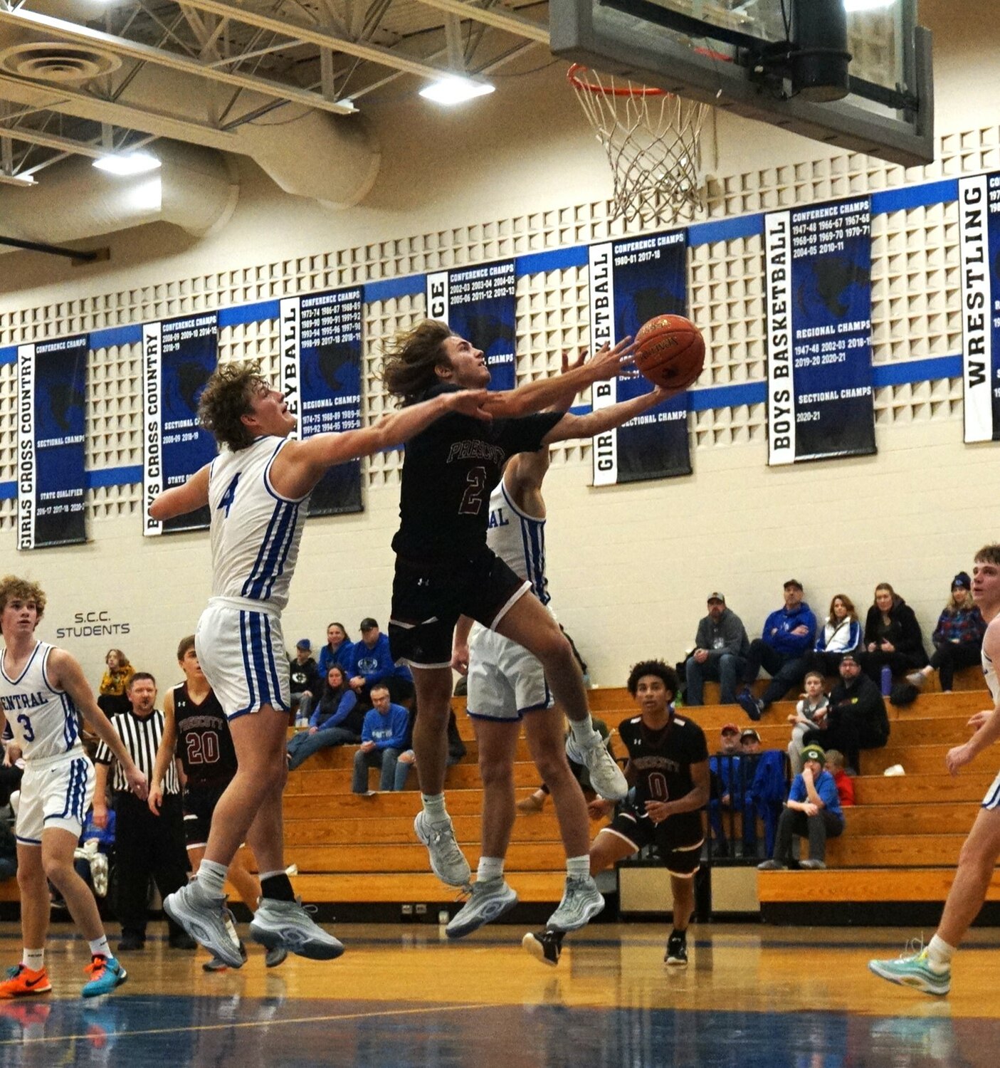Kyle Cogan makes a contested layup in Prescott's last game against the Saint Croix Central Panthers.