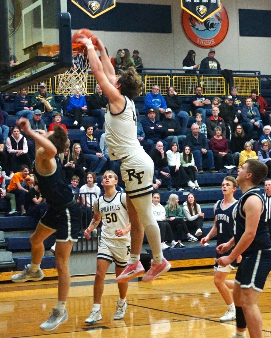 Eli Johnson dunking on conference rivals the Hudson Raiders in the Wildcats’ loss on Saturday in River Falls.