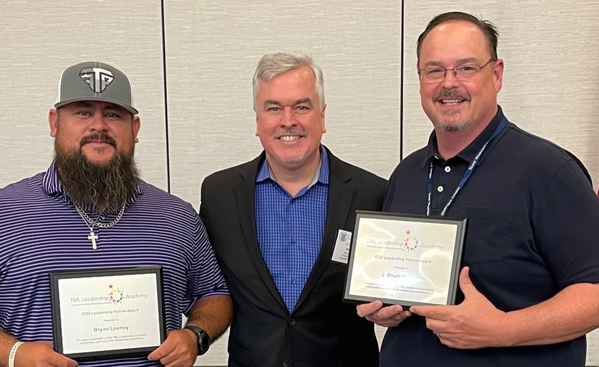 Bryan Looney, Post water utility director and J Rhett Parker, Post City Manager were awarded certificates by Bennet Sandlin, TML executive director at 2022 TML leadership Academy.