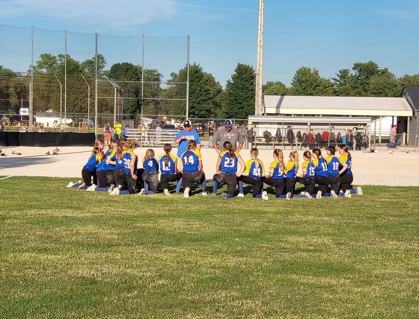 Coach Scott Dosch talks to his Crestwood Lady Eagle softball team after falling to a tough Charleston squad last weekend 6-4. It will be the crosstown battle Thursday when Crestwood travels to Roberts Field for a 6:30 p.m. game debuting the school&rsquo;s new lights. Mayo is unbeaten through today.