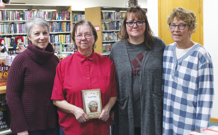 The Chrisman Library has released a cookbook full of local recipes. The idea of a cookbook was given to Donna Malone and the board ran with it. Pictured left to right are Malone, Beth Daily, Lori Mallory and Cheri Oates.