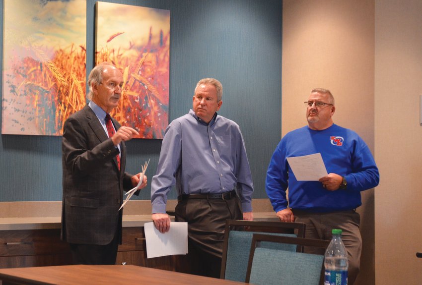 Mayor Craig Smith addresses fellow members of the PEDCO board. From left to right, Smith, Terry Elston and Scott Ingrum.