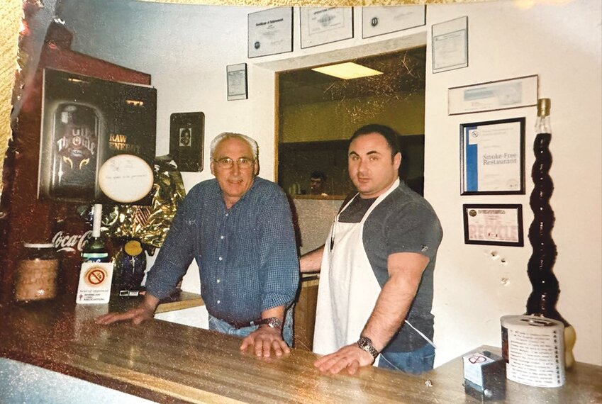 Joe&rsquo;s Pizza in Paris is celebrating 50 years in business with a weekend of giveaways and specials. A familiar sight through the years was the father and son team of Joe Vitale, left, and Eno Vitale, who along with his sister, Josephine, now operates the restaurant.