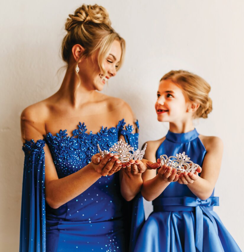 Miss Edgar County Caroline Smith, left, and Little Miss Edgar County Catelynn Cornwell, right, have a few more weeks left in their reigns. The 2023 Edgar County Fair queen pageant is July 23.