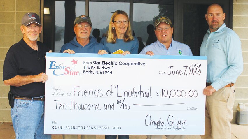 EnerStar representatives gave two $10,000 donations this week to Lincoln Trail State Park and Walnut Point State Park. Left to right are, EnerStar board member Danny Gard; Randy Hutts, Lincoln Trail employee; Debbie Hutts, Lincoln Trail employee; Tom Hintz, Lincoln Trail and Walnut Point site supervisor; and EnerStar board member Greg Robinson.
