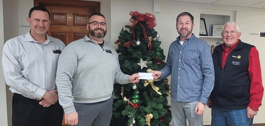 Members of the Paris Rotary Club invited Scott Barrett to present during a meeting on behalf of the Paris Community Nurse Association Christmas Food Baskets. Rotary made a generous donation of $1,000 which they hope will help provide food baskets for more than 250 families in Edgar County this year. Pictured left to right are John Brinkerhoff, Nolan Longest, Scott Barrett and Mike Step.