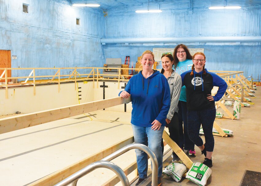 Rec Center staff stand in front of the safety railing installed around the facility&rsquo;s pool earlier this week. Pictured from left to right are Executive Director Erin Hutchison, Program Director Whitney Haase, Membership Team Leader Kelly Nicholson and team member Camille Scott.
