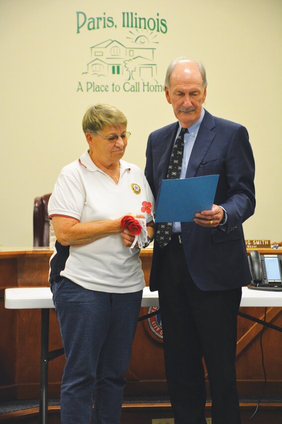 Diane Boyer represented Paris&rsquo; American Legion at a City Council meeting as Mayor Craig Smith proclaimed May 24 Poppy Day.