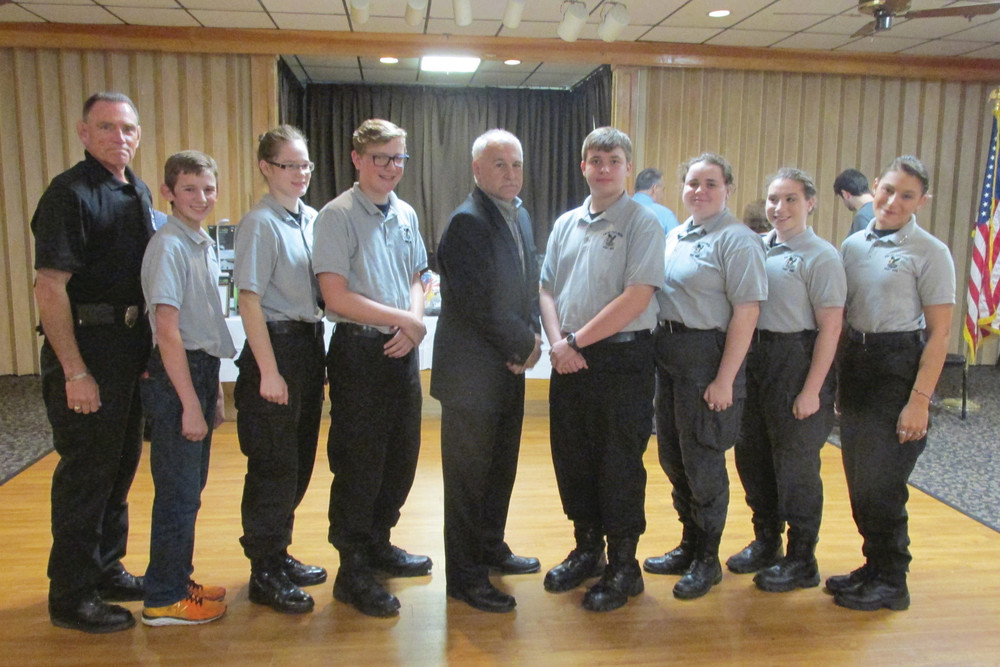SPECIAL SQUAD: Johnston Mayor Joseph Polisena is joined by members of Post 405 during Sunday&rsquo;s dinner. The group includes, from left, Capt. Thomas H. Dolan, Bailey Morin, Katherine Rocha, Zach Morin, Patrick Young, Heather Vest, Sofia Rengigas, and Allegra Graziano.
