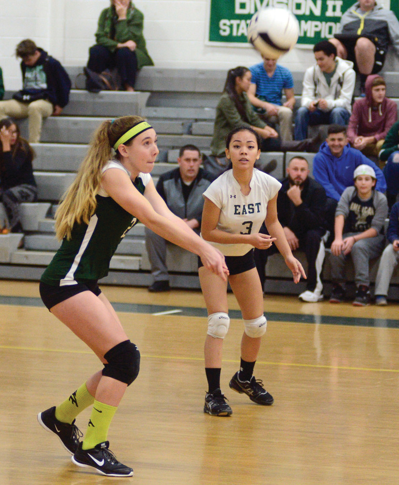 TEAM TO BEAT: Sam Levy's strong serving helped East down Scituate to remain unbeaten.