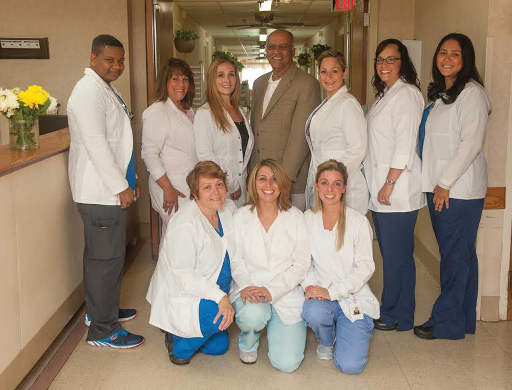 SUPER STAFF: These are some of the people responsible for Braircliffe Manor&rsquo;s five-star rating. Pictured, bottom row from left, are Theresa Buco, Christine Ring, and Amanda Parisella; and top from left, Jams Dorival, Deborah Petronelli, Jonna Matos, owner and CEO Akshay Talwar, Nicole Tudino, Elizabeth Koziol, and Jacqueline Sousa.