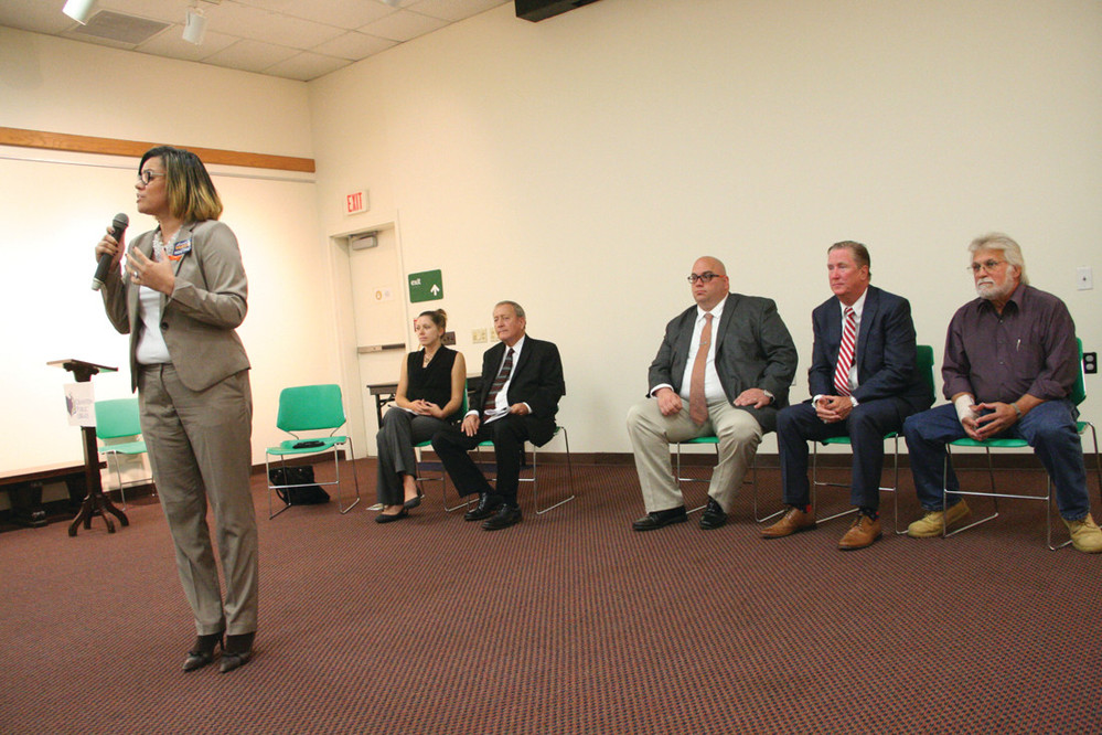 CITYWIDE HOPEFULS: From left, Lammis Vargas, Kate Aubin, Council President John Lanni, Councilman Michael Farina, Ken Hopkins, and Louis Petrucci take part in last week&rsquo;s citywide candidates forum at the Cranston Public Library.