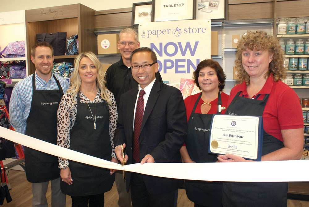 CITY&rsquo;S WELCOME: Mayor Allan Fung officially welcomed The Paper Store to the Garden City Shopping Center on Oct. 1 at the former Hallmark location. Pictured, from left, are COO Tom Anderson, district manager Tami Giardina, district Hallmark merchandiser Mike Barry, Fung, Hallmark manager Maribeth Izzi, and store manager Melynda Rouston.