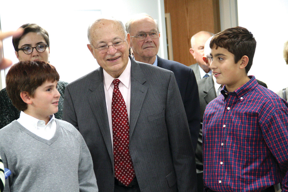 ON TOUR: Dr. Robert Baute, flanked by his grandsons Andrew and Owen Baute, tours the Kent Hospital Cardiac Catheterization Lab that was dedicated Tuesday in his name.