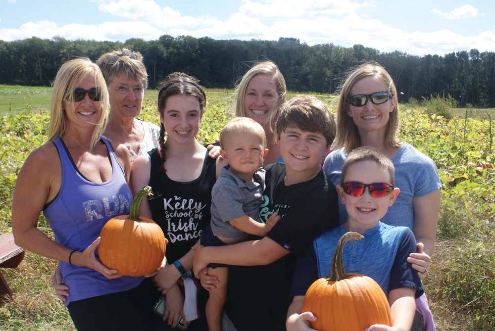FAMILY FUN: Having a good time this past weekend at the Confreda Farms Fall Festival were Kelly Geruso, Linda Jones, Kyleigh Felice, 11, Lauren Spink, Nick Geruso, 13 &ndash; holding his one-year-old cousin Michael Spink &ndash; Melissa Felice, and Aiden Felice, 9.