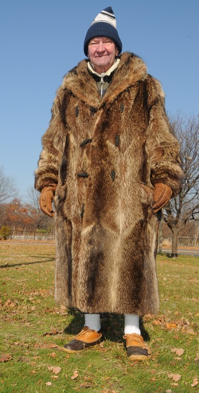 F. Steele Blackall III wears his family's raccoon coat to every Harvard-Yale game