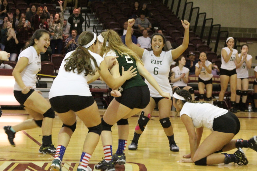 MATCH POINT: The Cranston East girls' volleyball team celebrates after securing the win in its semifinal match against Juanita Sanchez on Wednesday night. The 'Bolts will play Scituate for the D-II title on Saturday at 2 p.m. at Rhode Island College.