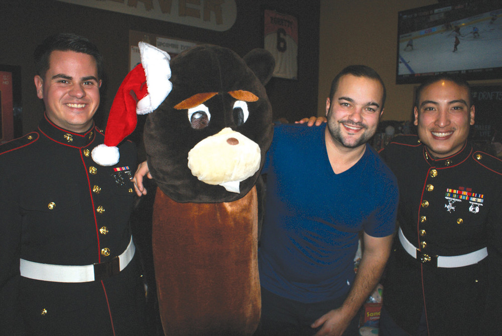 GEARING UP FOR A GREAT NIGHT: The Thirsty Beaver&rsquo;s 3rd Annual Toys for Tots Holiday Drive was organized by Ed Brady, co-owner of The Thirsty Beaver, along with the Thirsty Beaver Mascot and Marines, Sgt. Brandt Weilbacher and LCPL David Sevigny.