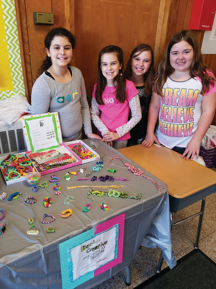 BEE-ING CRAFTY FOR A GOOD CAUSE: Sophia Deal, Mia Santomassio, Kyleigh Davis and Allison Needham put their crafting skills to good use last week, selling their homemade accessories to raise money for the Cranston Animal Shelter.