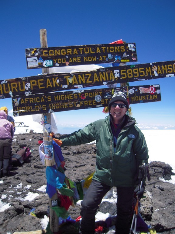 Don Schwartz atop Mt. Kilimanjaro