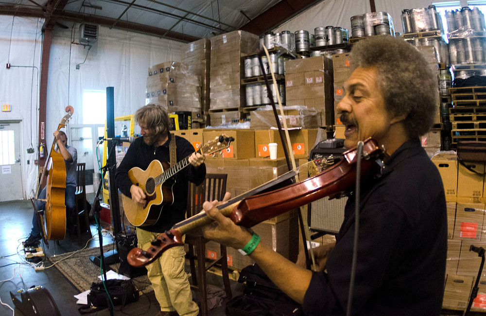 Neal McCarthy Music entertains inside the Buzzards Bay Brewing warehouse at a fundraiser earlier this fall for the American Association for the Prevention of Cruelty to Animals.