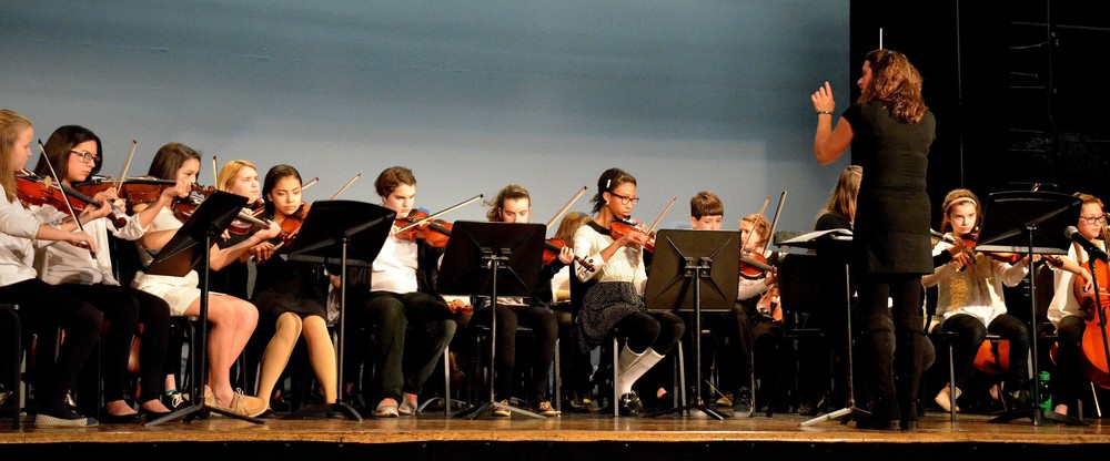 Alicia Ruggiero conducts Community String Project students during Winter Youth Concert last Wednesday at Mt. Hope High School.