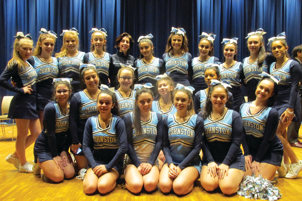 GOVERNOR&rsquo;S GROUP: After receiving two official JHS jackets, Gov. Gina Raimondo was surrounded by the Panthers&rsquo; champion cheerleading squad and later took photos with each member of the team.