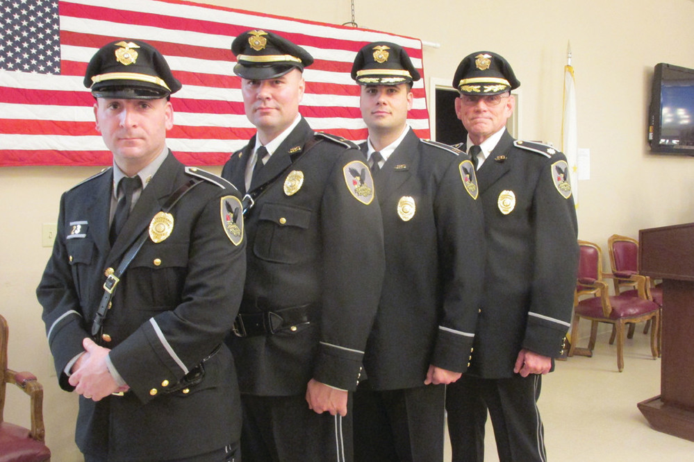 QUALITY QUARTET: The four JPD officers, who were promoted to their new rank Monday, are, from left: Sgt. Joseph A. McGinn, Lt. Troy J. Maddocks, Capt. Mark A. Vieira and Major Thomas H. Dolan.