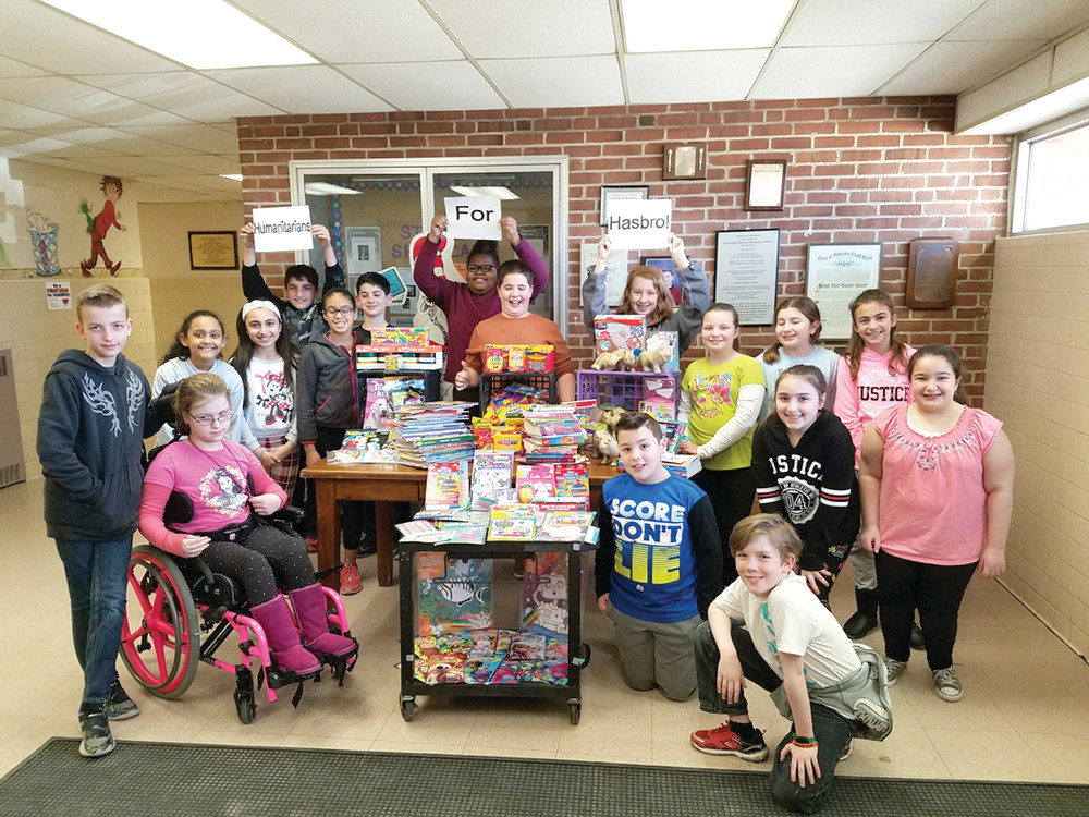 HUGE HUMANITARIANS: The fifth-grade students at Sarah Dyer Barnes Elementary School were thrilled to see the results of their efforts after having spent two weeks sponsoring a collection of activity and craft items which will be delivered to Hasbro Children's Hospital for the patient activity rooms. The drive was part of the school's Feinstein Good Deeds program.