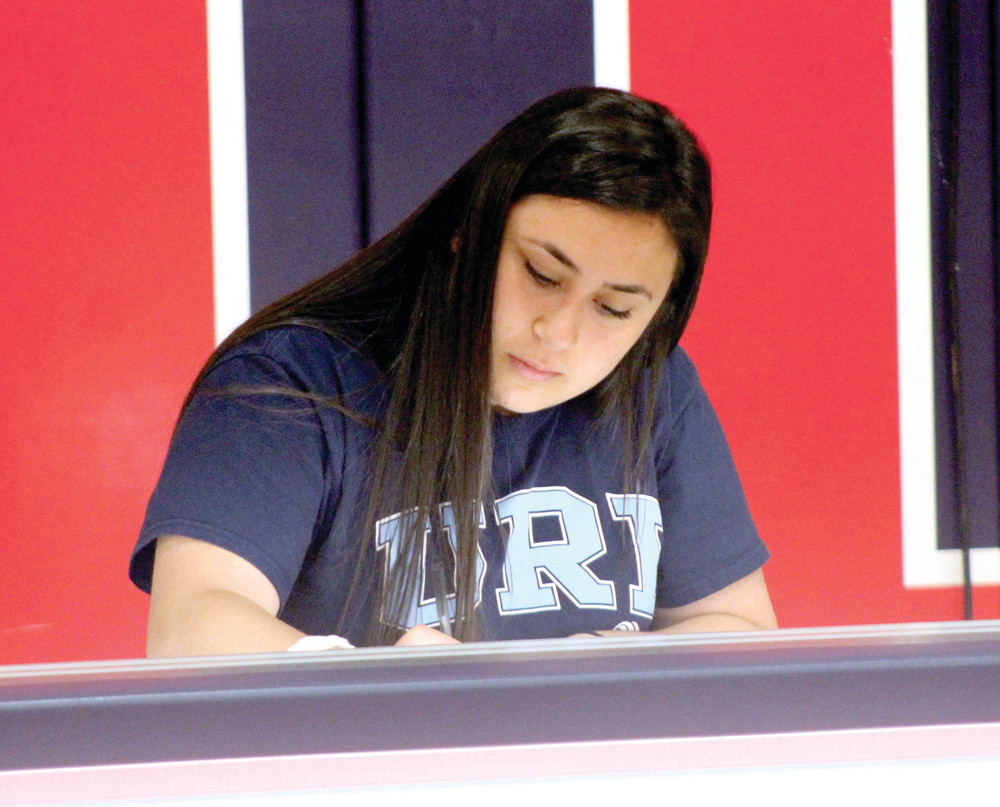 SIGNING: Ani Armenakyan signs her National Letter of Intent to URI on Thursday at Toll Gate.