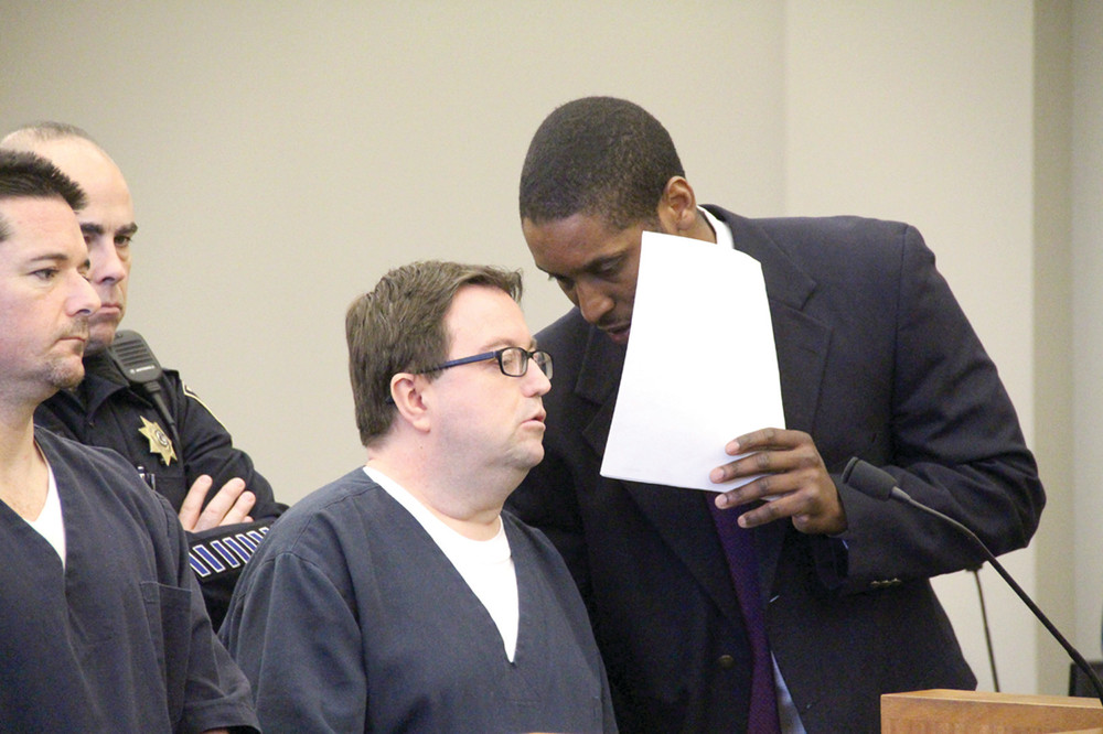 AT HEARING: Public defender Christopher Smith (right) confers with Jacob Gallant,zz who is charged with stabbing with intent to murder Alyssa Garcia, a Rite Aid employee. Police say there is no connection between Gallant and Garcia and he selected her at random to attack.