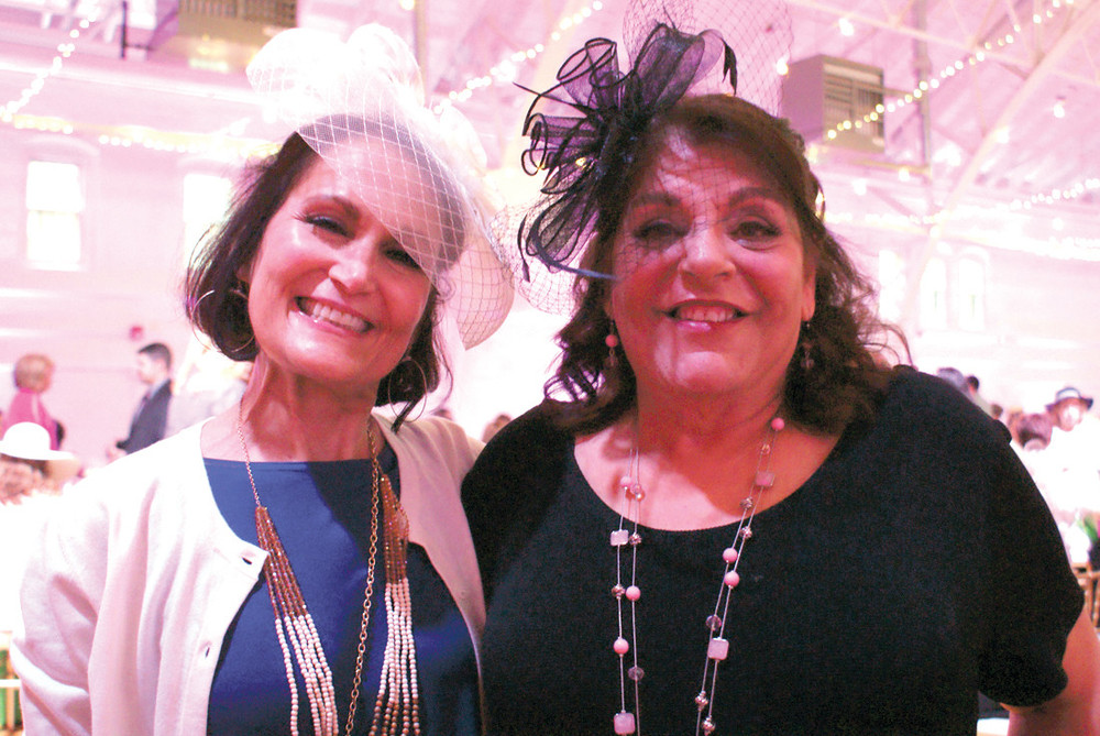 DERBY SMILES: Pictured are Maria Gemma, Executive Director of the Gloria Gemma Breast Cancer Resource Foundation and breast cancer survivor Pat Andrews of Johnston at the fashion show.