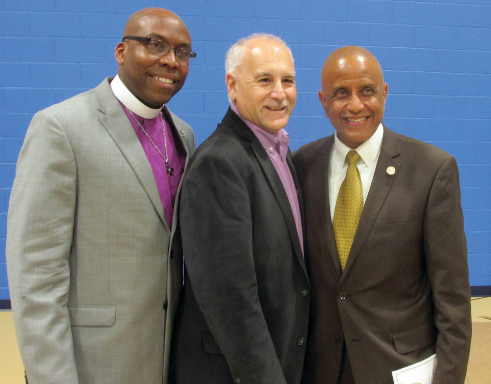 SPECIAL SPEAKERS: Mayor Joseph Polisena greets Rev. Chris Adhulime (left) of King&rsquo;s Tabernacle Church and NAACP Providence Chapter President James Vincent, who both played a part in Saturday&rsquo;s grand opening.