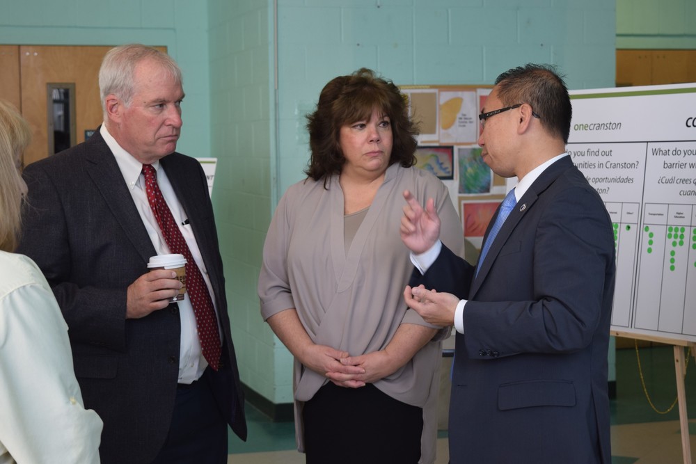 PRIOR TO THE CELEBRATION: From left to right, Boston Fed President and CEO Eric Rosengren, CCAP President and CEO Joanne McGunagle and Mayor Allan W. Fung chat prior to Thursday's roundtable.