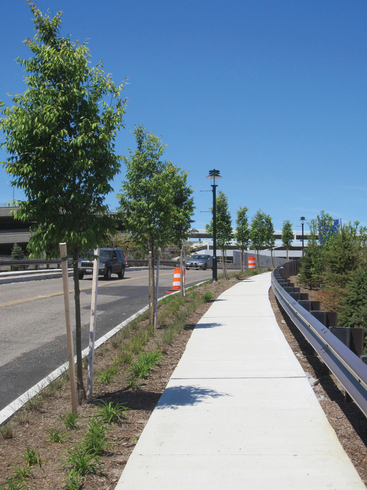 BEFORE AND AFTER: While it remains a major thoroughfare, Coronado Road has been transformed to a pedestrian-friendly connection between Post Road and Jefferson Boulevard.